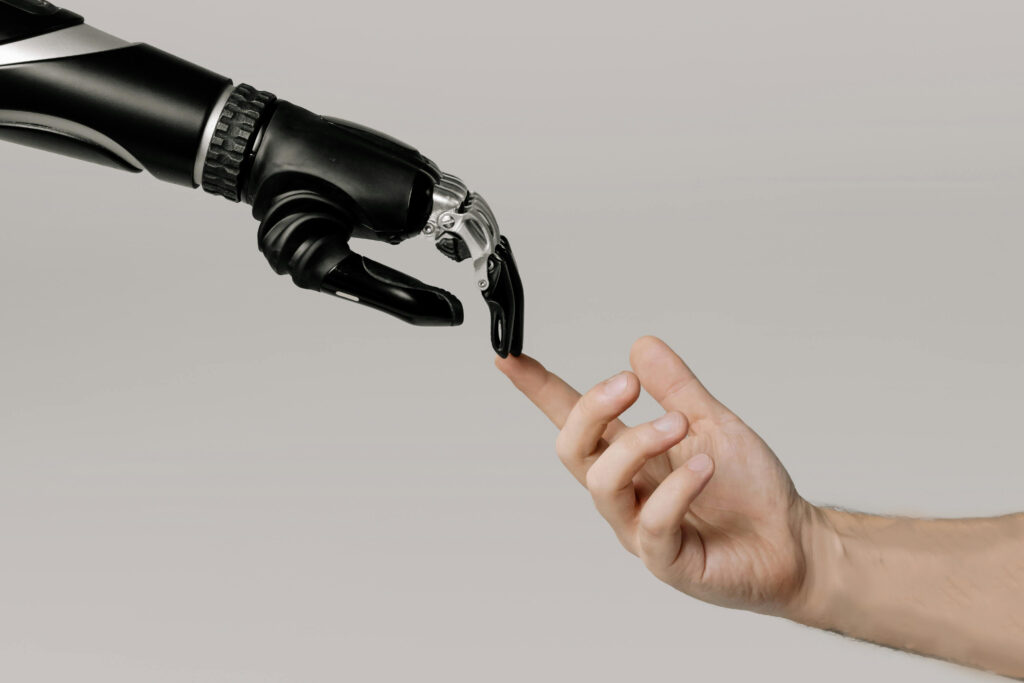 AI in sales robot hand touching human hand